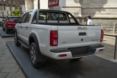 Rear view of 4WD pickup truck with rugged step board and stylish tail lights
