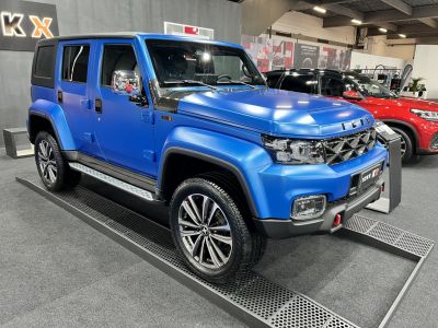 Bold front grille and modern LED headlights with rugged SUV styling