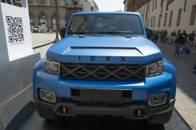 Front view featuring bold grille and dual modern headlights