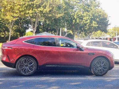 Sleek electric SUV side profile with modern alloy wheels