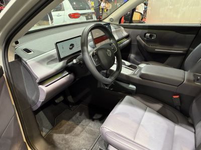 Digital dash display with modern steering wheel and center console