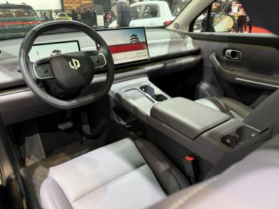 Minimalist interior with digital dashboard and large touchscreen