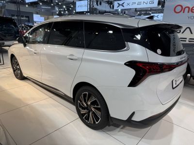 Rear side profile with distinctive tail lights and alloy wheels