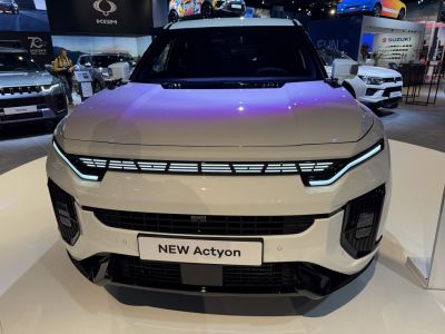 Front view with LED light bar and distinctive grille design