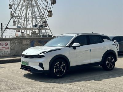 Front side view with sporty alloy wheels and sleek LED headlights
