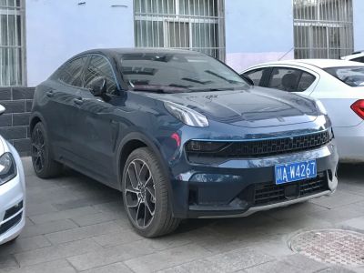 Front profile of a modern crossover SUV with split LED headlights