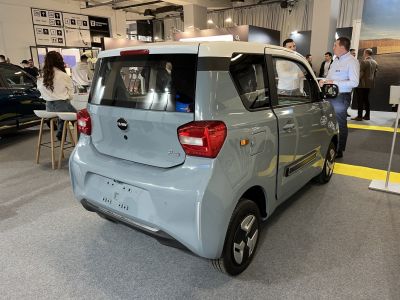 Compact urban vehicle rear with modern taillights and boxy design