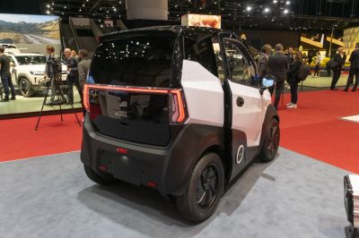 Compact urban electric vehicle rear with LED lights and two-tone design