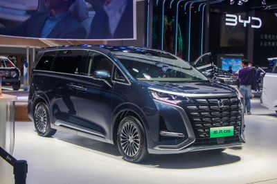 Luxury MPV with bold grille and sleek LED headlamps