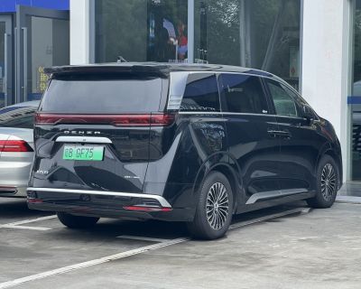 Rear view with wide horizontal taillight and sleek aerodynamic body