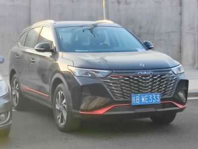 Aggressive front grille and modern SUV styling with LED headlights.