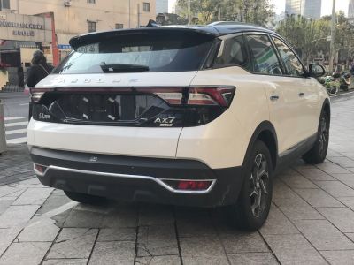 Rear view of white SUV with unique taillights and rear bumper