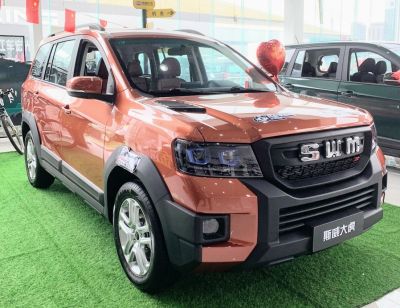 SUV with rugged front grille and LED headlights