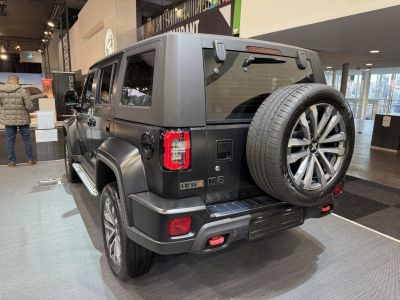 Rugged SUV rear with mounted spare tire and distinct rear lighting