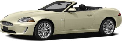 Sleek two-door convertible with curved body and distinct headlights