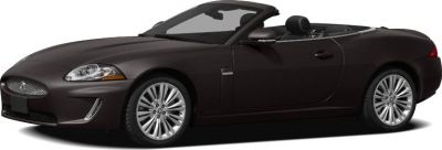 Sleek luxury convertible with open roof and sporty alloy wheels