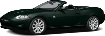 Open-top luxury sports car with sleek body and alloy wheels