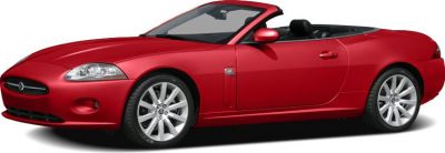 Red convertible with soft-top and stylish alloy wheels