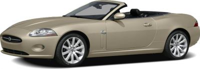 Sleek luxury convertible with elegant design and sporty profile.