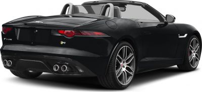 Dual quad exhausts and sleek tail lights on a convertible rear view