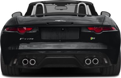 Rear view of convertible sports car with quad exhaust and distinct tail lights