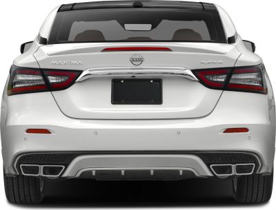 Rear view with quad exhaust, distinctive taillights, and Platinum trim badge