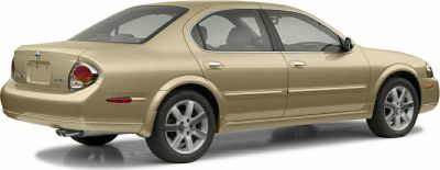Rear side profile with rounded tail lights and smooth body contours