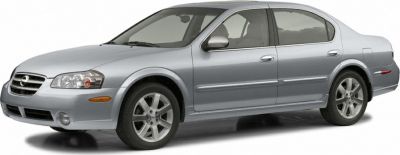 Silver 4-door sedan side view with alloy wheels.