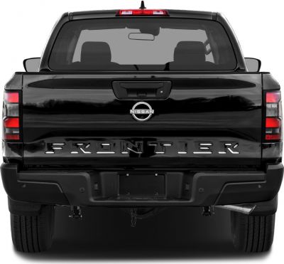 Rear view of pickup tailgate with distinctive lettering and modern taillights