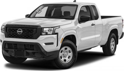 White extended cab pickup with rugged front grille and alloy wheels