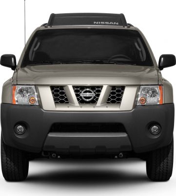 Front view with rugged grille and robust bumper
