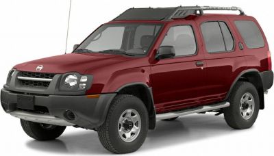Front-side view of SUV with roof rack and off-road tires