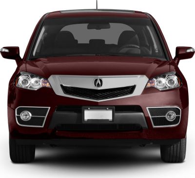 Front view with distinctive headlights, chrome-accented grille, and fog lights