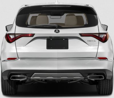 Rear view with updated LED taillights and dual exhaust of a modern SUV