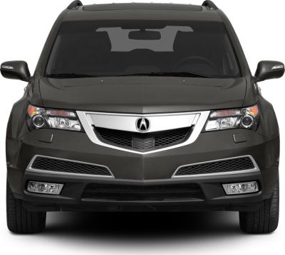 Front view with prominent grille and headlights of a robust SUV.