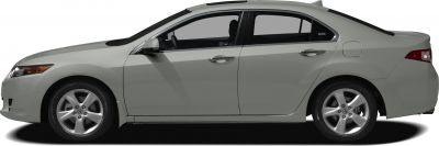 Side profile of a four-door sedan with alloy wheels