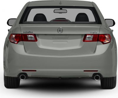 Rear view with dual exhaust and uniquely shaped tail lights