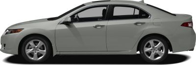 Side profile of a four-door sedan with alloy wheels.