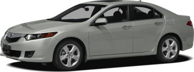 Front-side view of a sedan with sleek headlights and alloy wheels