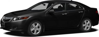 Sleek front grille and side profile of a modern sedan with alloy wheels