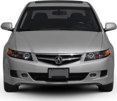 Front view showing headlights, grille, and fog lights