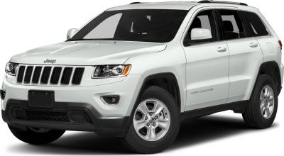 White SUV front side view with alloy wheels and seven-slot grille