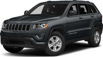Front-side view of SUV with distinctive grille and headlamps