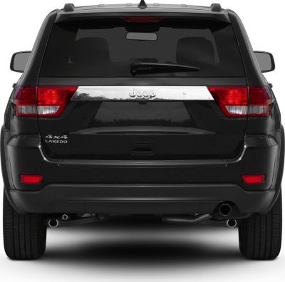 Rear view with taillights, chrome strip, rear wiper, dual exhaust