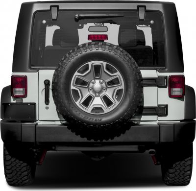 Spare tire mounted on rear door with off-road tires and tail lights