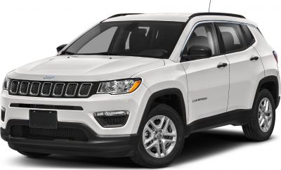 Front-side view of a compact SUV with distinctive grille and modern headlights.