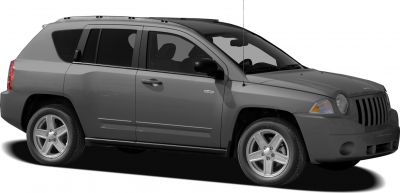 Side profile and front view with round headlights and alloy wheels