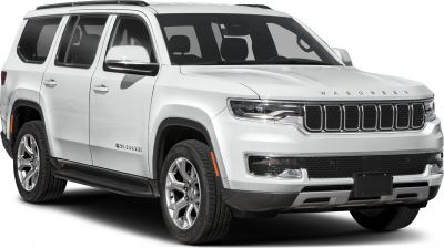 White SUV with modern front grille and LED headlights