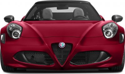 Front view with distinctive headlights and triangular grille