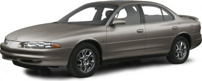 Side profile of sleek sedan with chrome multi-spoke wheels
